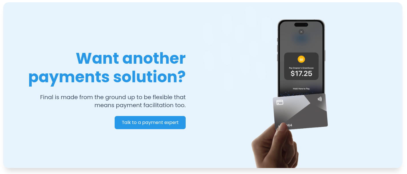 a hand holding a phone and credit cards